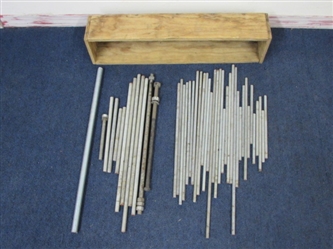  A LARGE ASSORTMENT OF COURSE THREADED RODS 