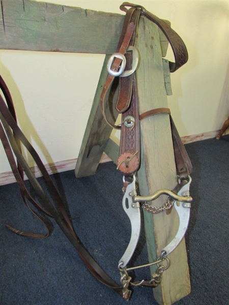 NEAT WESTERN LEATHER BRIDLE WITH SILVER PLATE CONCHOS, BIT & REINS PLUS 2 HAY NETS & A WOODEN SAW HORSE TO HOLD YOUR STUFF.