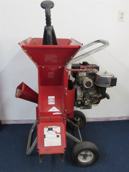 TROY BUILT 8 HP WOOD CHIPPER WITH A BRIGGS & STRATTON ENGINE 