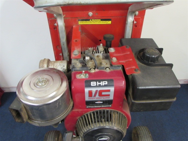 TROY BUILT 8 HP WOOD CHIPPER WITH A BRIGGS & STRATTON ENGINE 