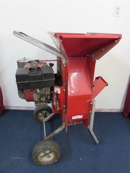 TROY BUILT 8 HP WOOD CHIPPER WITH A BRIGGS & STRATTON ENGINE 