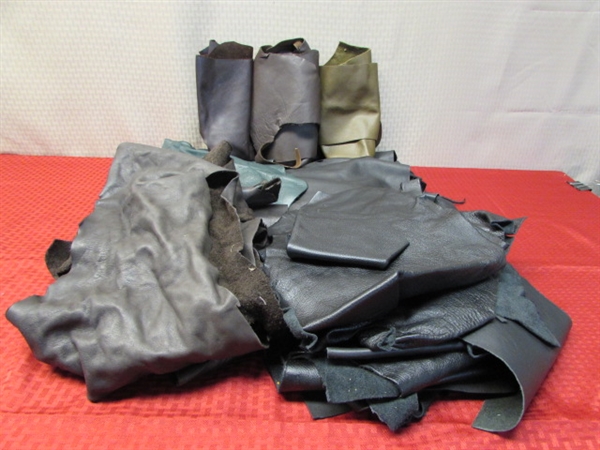 WONDERFUL COLLECTION OF  CLOTHING GRADE LEATHER IN FOUR COLORS MOSTLY BLACK.