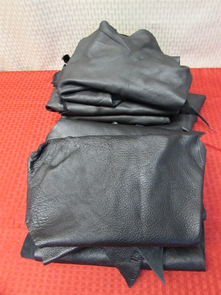WONDERFUL COLLECTION OF  CLOTHING GRADE LEATHER IN FOUR COLORS MOSTLY BLACK.