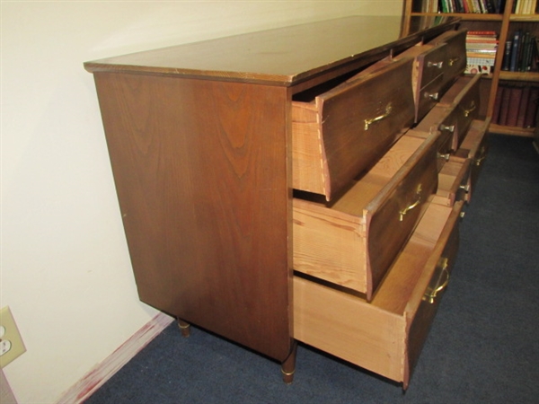 ALL WOOD NINE DRAWER DRESSER WITH PRETTY CURVED FRONT