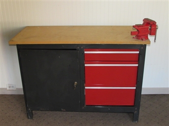 STURDY WORK STATION WITH LOTS OF STORAGE SPACE & A SWIVEL BASE BENCH VISE