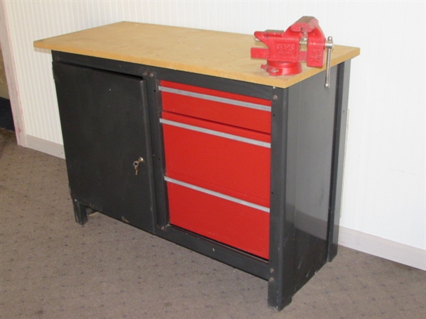 STURDY WORK STATION WITH LOTS OF STORAGE SPACE & A SWIVEL BASE BENCH VISE