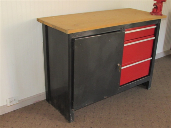 STURDY WORK STATION WITH LOTS OF STORAGE SPACE & A SWIVEL BASE BENCH VISE