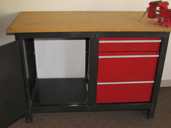 STURDY WORK STATION WITH LOTS OF STORAGE SPACE & A SWIVEL BASE BENCH VISE