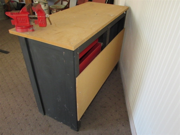 STURDY WORK STATION WITH LOTS OF STORAGE SPACE & A SWIVEL BASE BENCH VISE