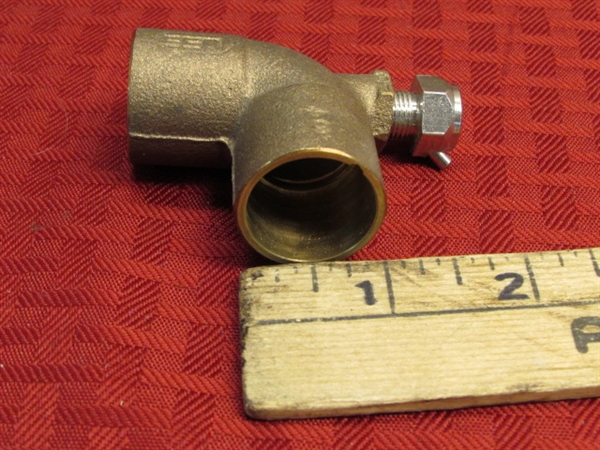 THREE BRASS VALVES & A FITTING OVER 4 LBS. OF BRASS