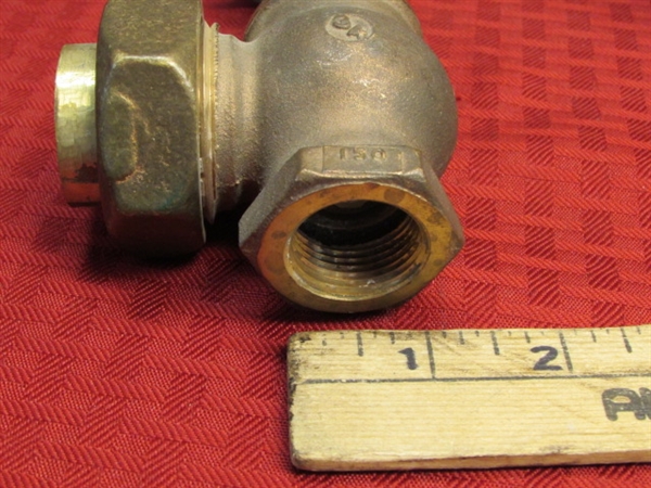 THREE BRASS VALVES & A FITTING OVER 4 LBS. OF BRASS