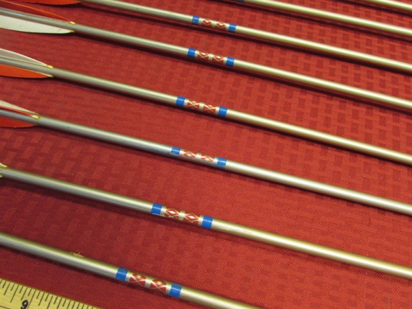 ELEVEN VINTAGE WOOD ARROWS WITH BROADHEADS