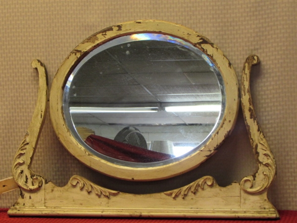 BEAUTIFUL ANTIQUE OVAL BEVELED MIRROR IN TILT FRAME WITH ORNATE CARVED LEAVES