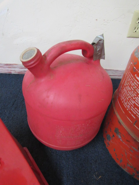 Lot Detail - NICE PLASTIC CHOCKS A METAL 5 1/4 GALLON GAS CANS & 2