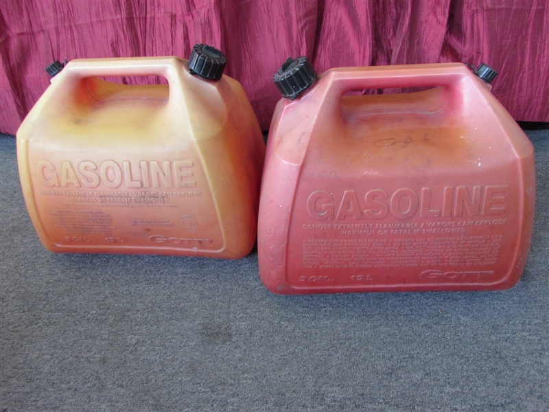 FOUR PLASTIC 5 GALLON GAS CANS