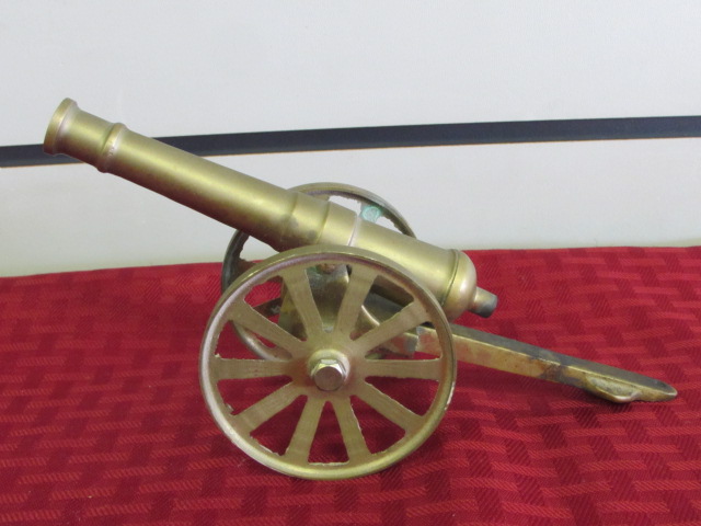 Lot Detail - VINTAGE MINIATURE BRASS CANNON! CANNON MOVES UP & DOWN ...