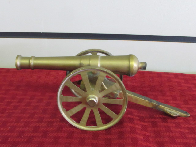 Lot Detail - VINTAGE MINIATURE BRASS CANNON! CANNON MOVES UP & DOWN ...