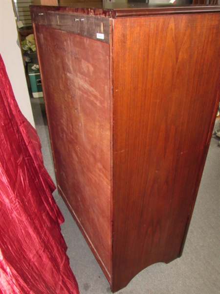GORGEOUS ANTIQUE TALL BOY DRESSER WITH HAND CARVED DRAWER PULLS. SEE MIRROR IN NEXT LOT!