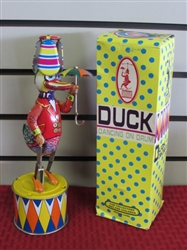 COLLECTIBLE TIN LITHOGRAPH DUCK DANCING ON DRUM TOY