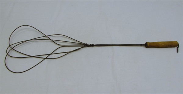 ANTIQUE RUG BEATER