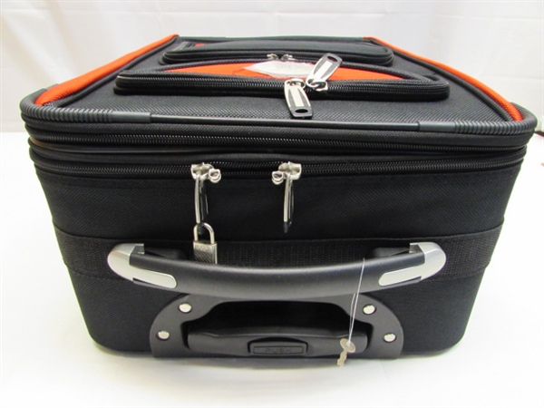 BRAND NEW BELLA RUSSO ROLLING SUITCASE