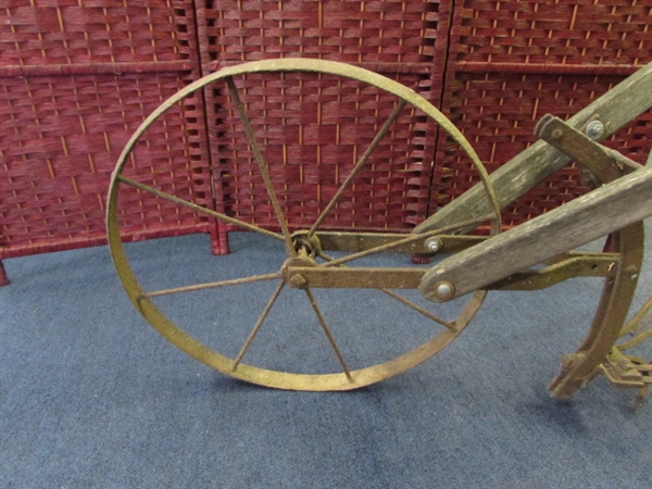 ANTIQUE GARDEN CULTIVATOR WITH METAL WHEEL