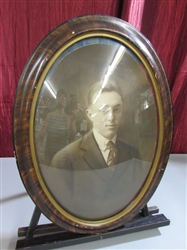 BEAUTIFUL ANTIQUE OVAL FRAME WITH CONVEX GLASS