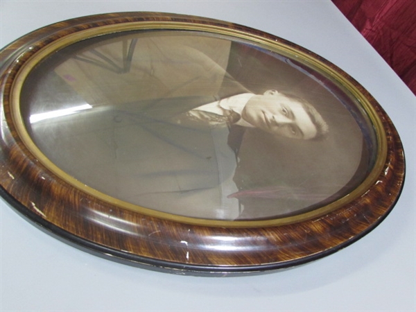 BEAUTIFUL ANTIQUE OVAL FRAME WITH CONVEX GLASS