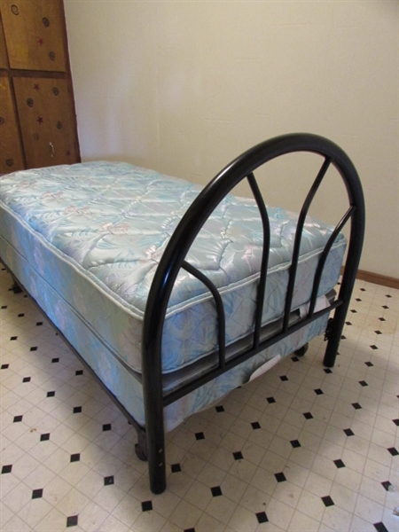 TWIN BED WITH METAL HEADBOARD