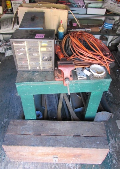 CENTER WORK TABLE IN THE METAL SHED