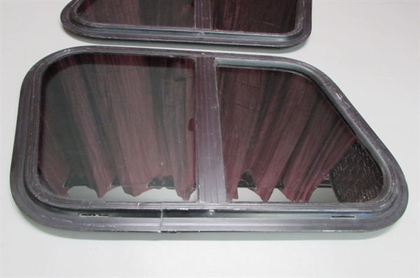 TINTED SLANTED GLASS SLIDING WINDOWS WITH SCREENS