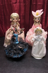 4 VINTAGE STAND ALONE DOLLIES