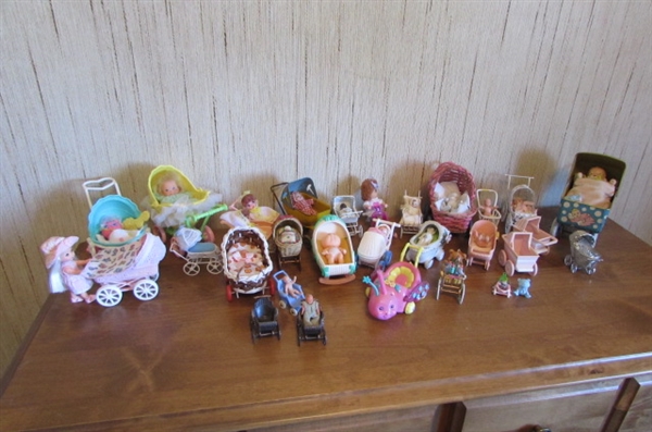 ANTIQUE & MODERN MINIATURE BABY DOLLS AND CARRIAGES