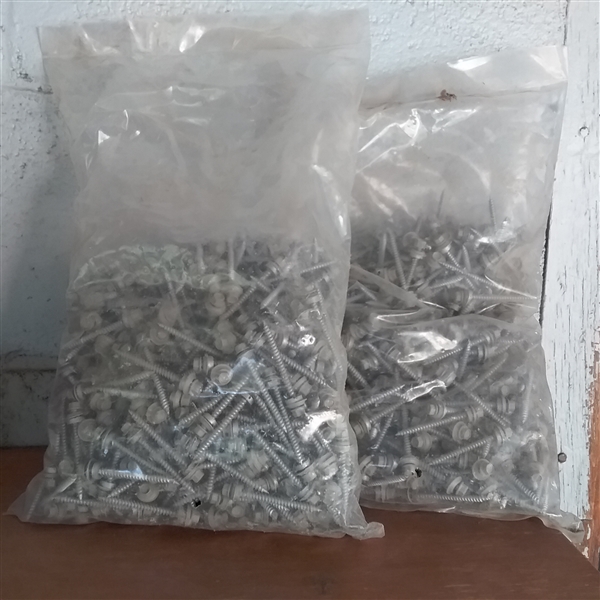 2 BAGS OF 2 TIN ROOFING SCREWS