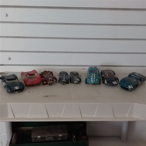 METAL TOOL BOX FULL OF VINTAGE ELECTRIC TOY RACE CARS