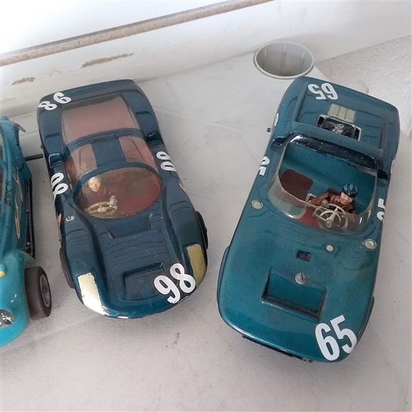 METAL TOOL BOX FULL OF VINTAGE ELECTRIC TOY RACE CARS