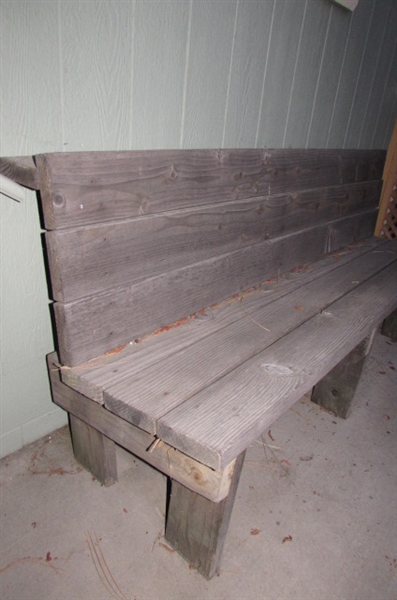 WEATHERED WOODEN BENCH WITH ANGLED END