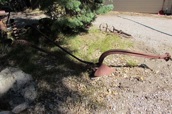 ANTIQUE PLOW YARD ART