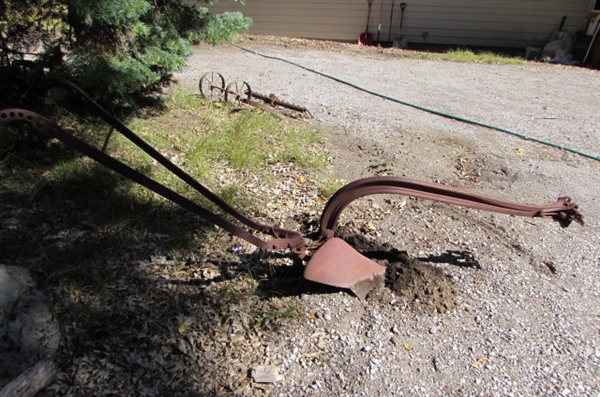 ANTIQUE PLOW YARD ART