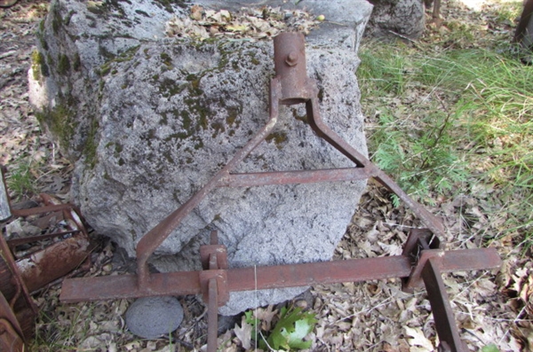 ANTIQUE EDGER YARD ART