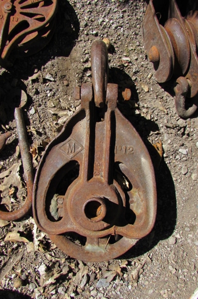 OLD METAL PULLEYS FOR YARD ART