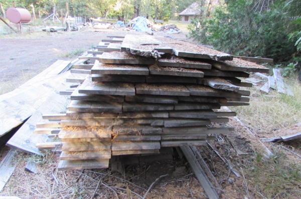 PILE OF 1 X 12 X 10' LUMBER