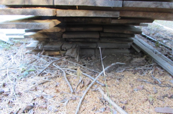 PILE OF 1 X 12 X 10' LUMBER