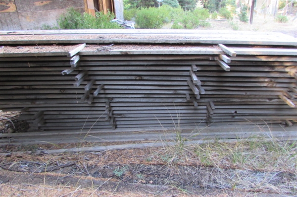 PILE OF 1 X 12 X 10' LUMBER