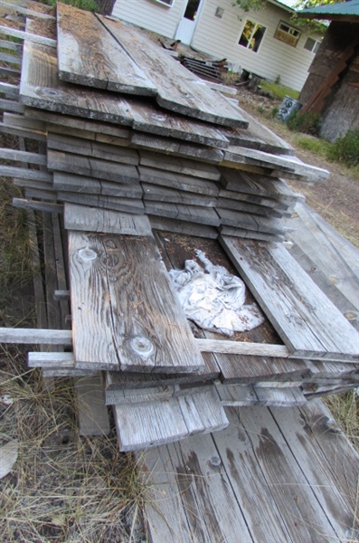 PILE OF 1 X 12 X 10' LUMBER