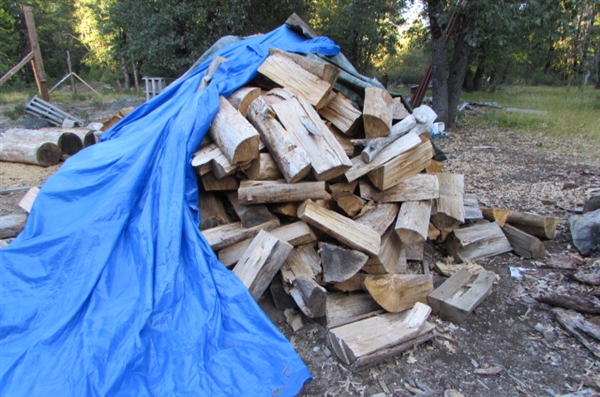 PILE OF SPLIT FIREWOOD