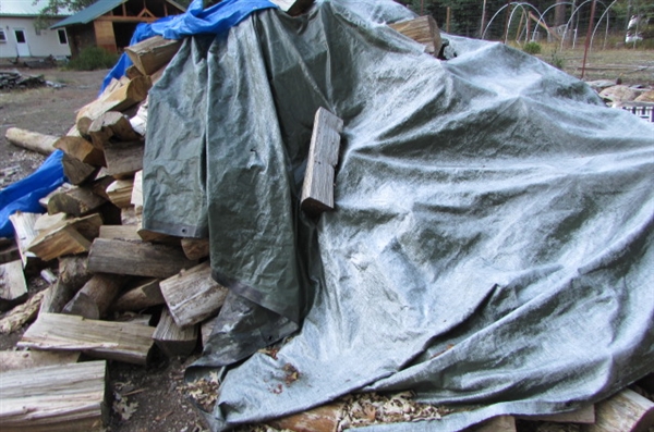 PILE OF SPLIT FIREWOOD