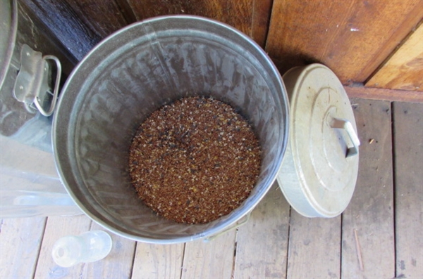 2 GALVANIZED CANS WITH WILD ANIMAL FEED & BIRD FEEDERS