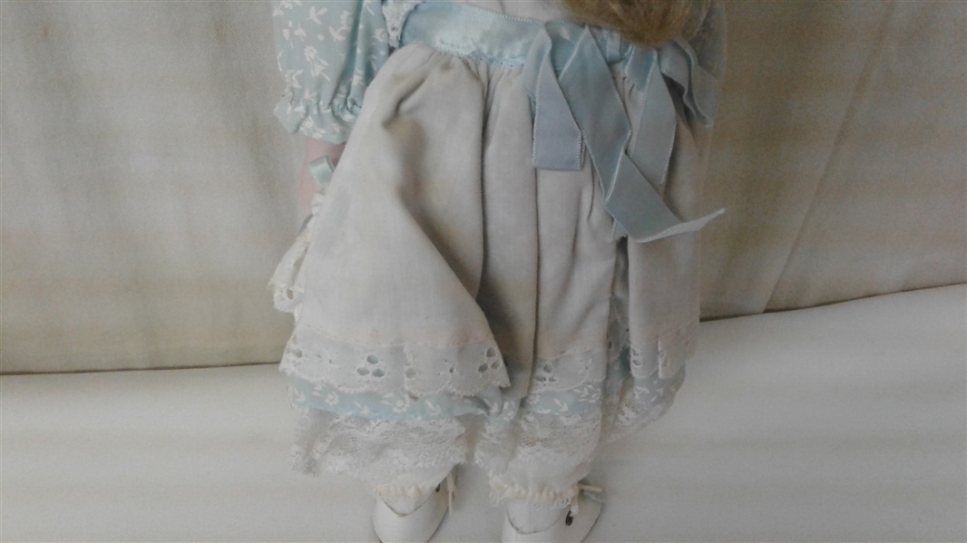 15 PORCELAIN DOLL