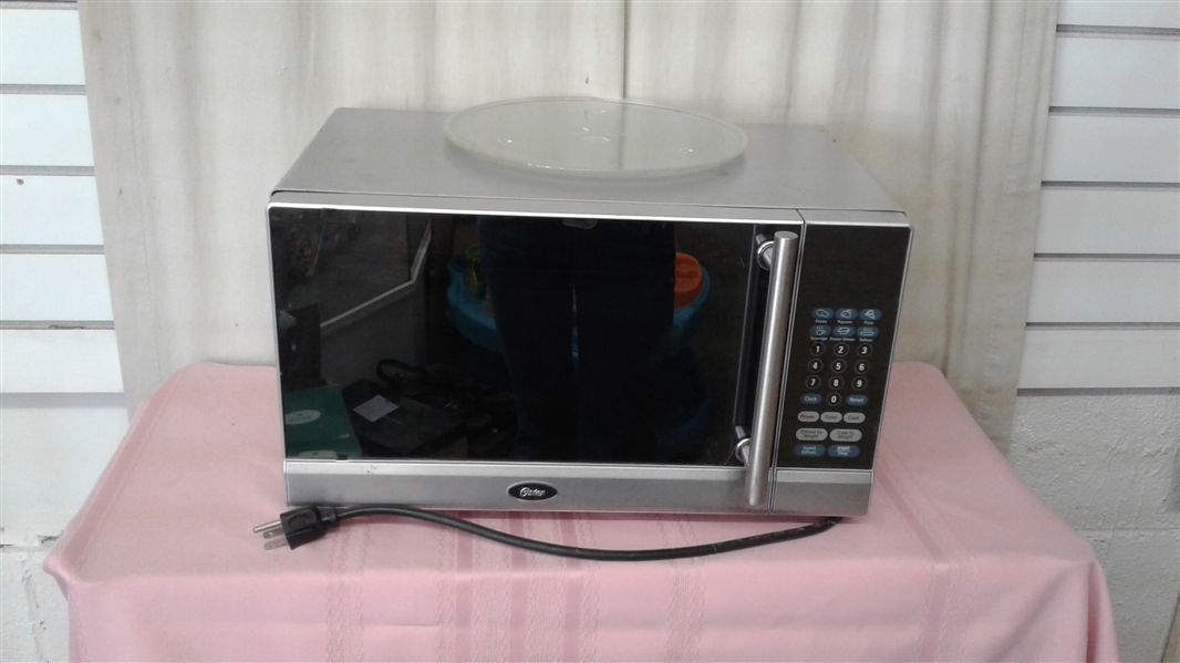 STAINLESS OSTER 700 WATT MICROWAVE